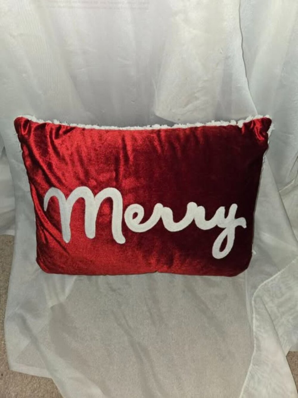 The Red Velvet Merry Christmas Embroidered Pillow is an Embroidery